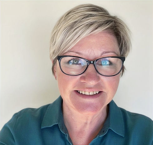 Headshot close up_edited.jpg