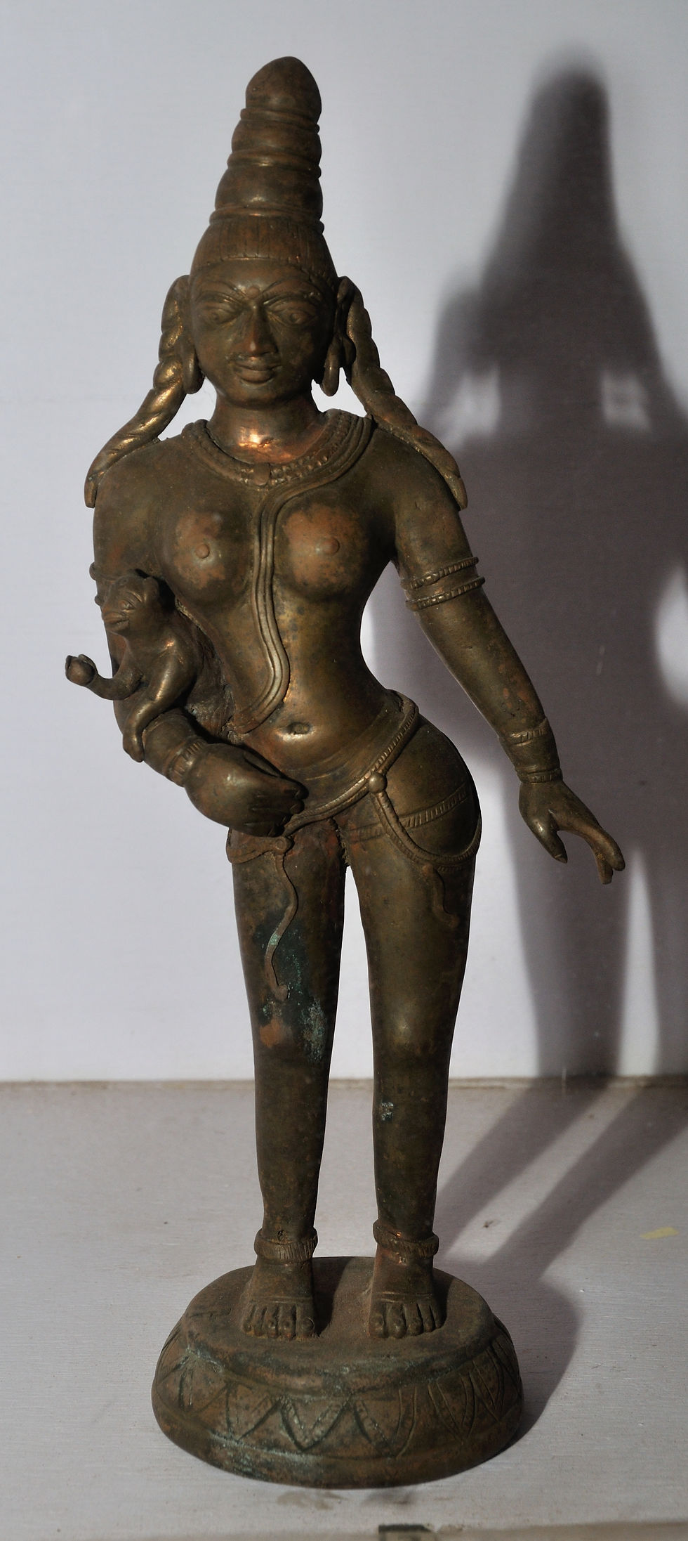 bronze statue of Anjana with her baby
