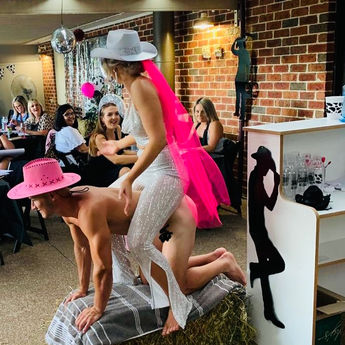 Bride and model for a life drawing hens party class