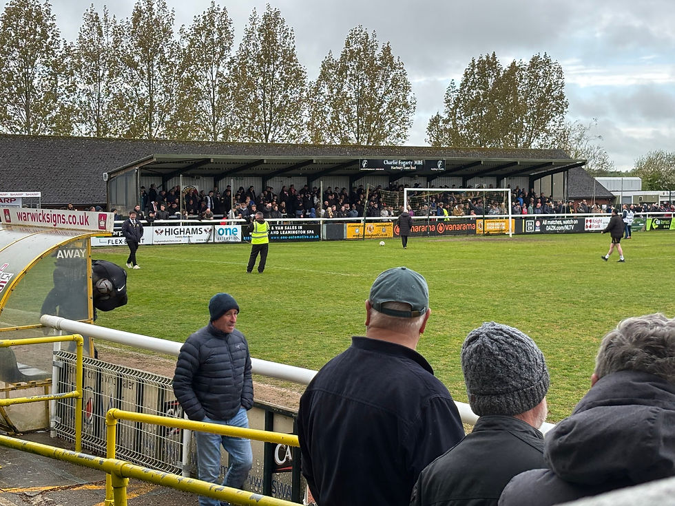 A packed very vocal away end at Leamington FC full of Brackley Supporters