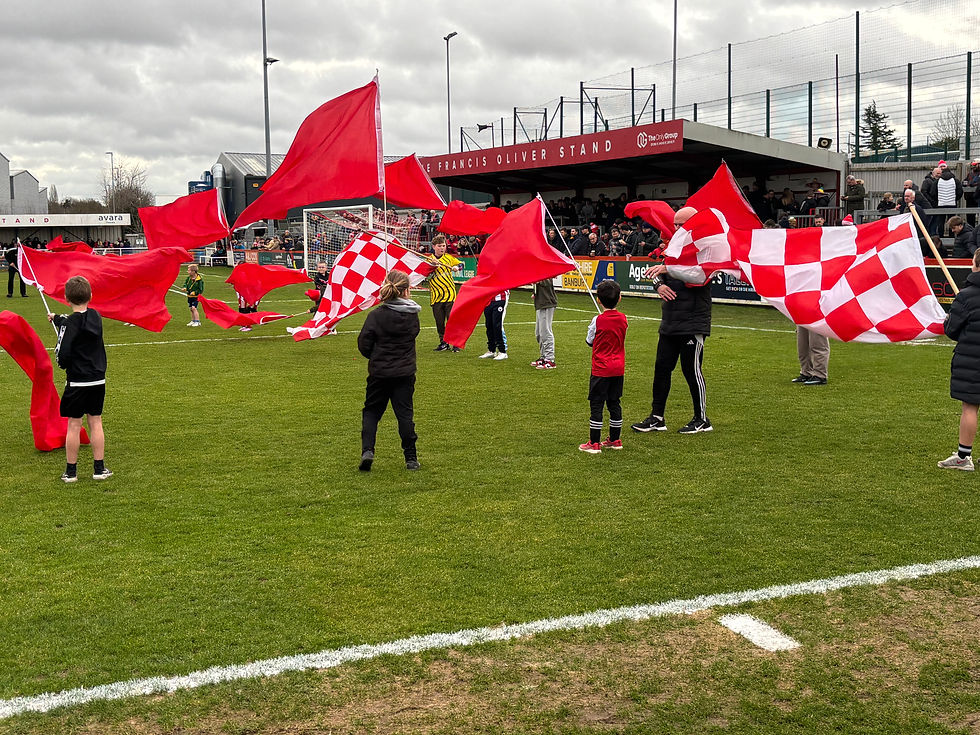 Brackley flag greet to new manager Andy Whing before today’s match with Southend
