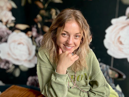Girl smiling in a cafe