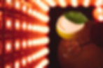 double exposure of a cocktail and lights