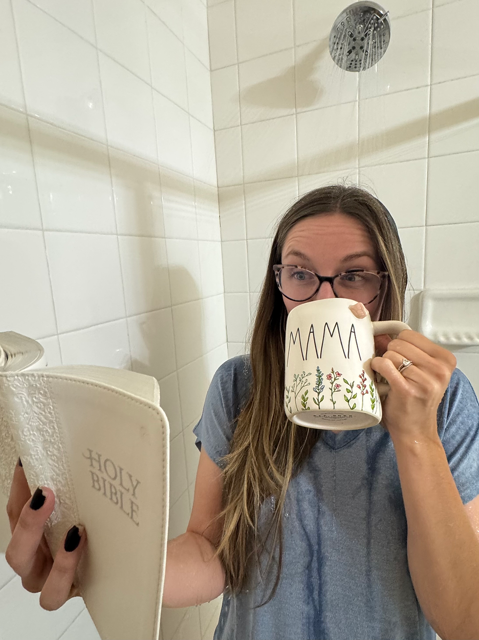 A woman drinking coffee and reading the Bible in the shower