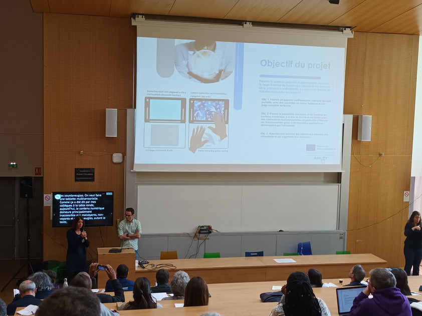 S. Panëels presenting the ABILITY project and in particular the concept of the haptic tablet