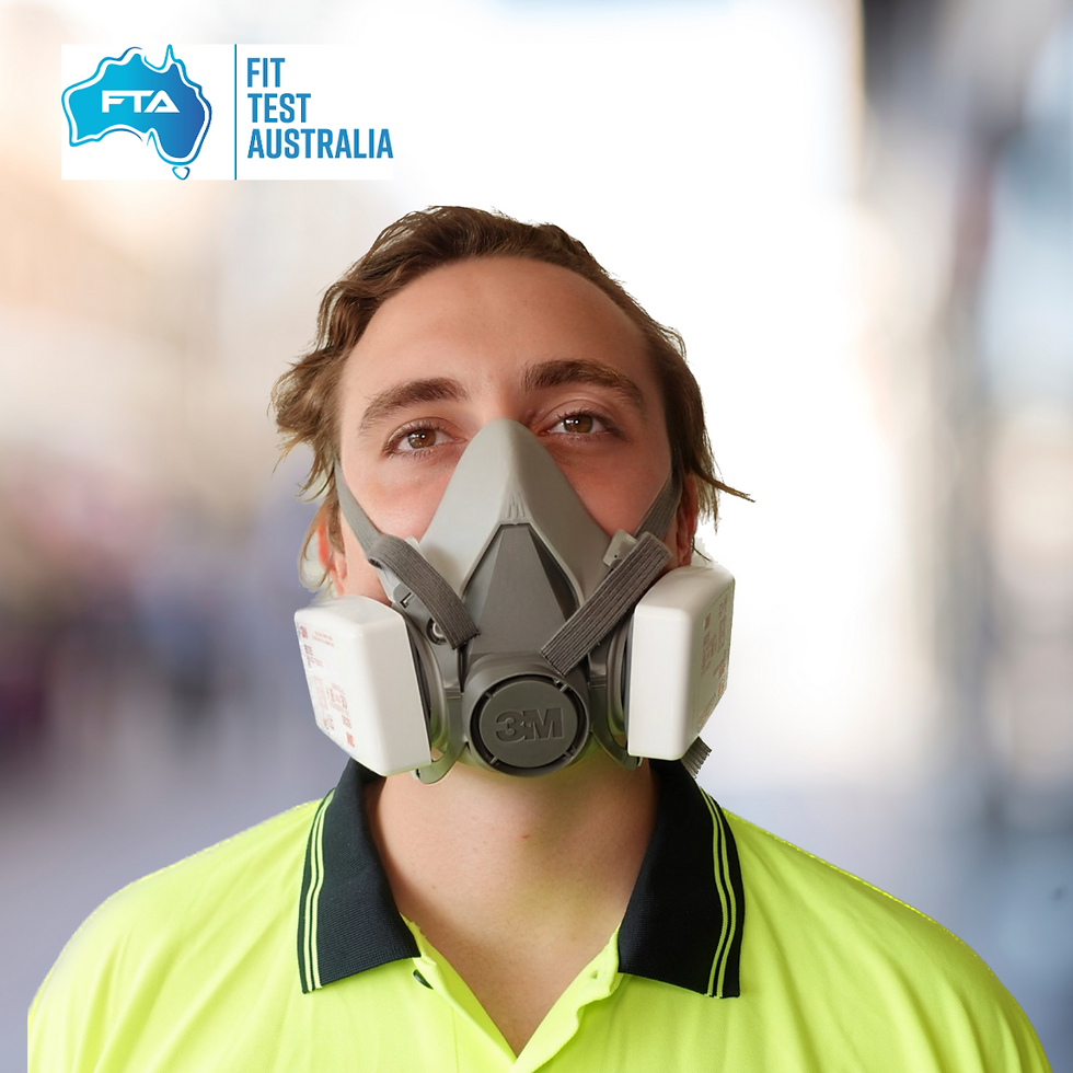 Half-face reusable elastomeric respirator with assigned protection factor of 10, worn by a worker at Fit Test Australia