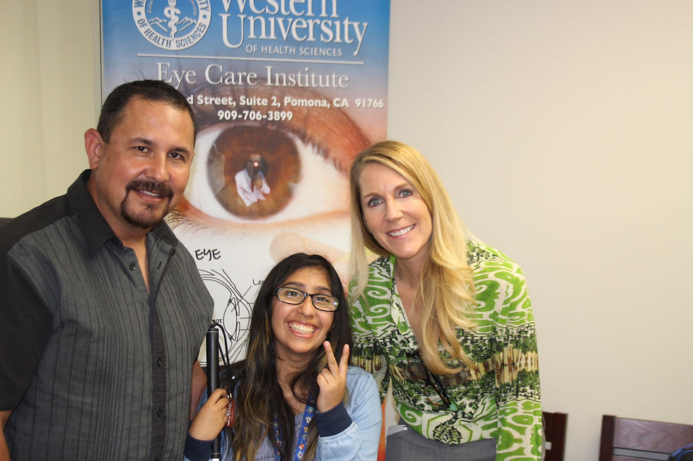 Emily Rubalcava with her father Israel and Tori Schladen. Emily's family has been receiving services from Partners for Pediatric Vision since 2015, when Emily's vision began to decrease. She is an outstanding student and uses low vision technology and Braille to achieve academic success.