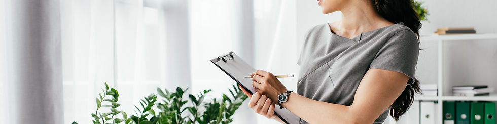 Marketing employee writing on a clickboard