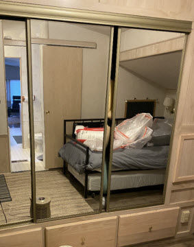 Bedroom and Mirrored Closet