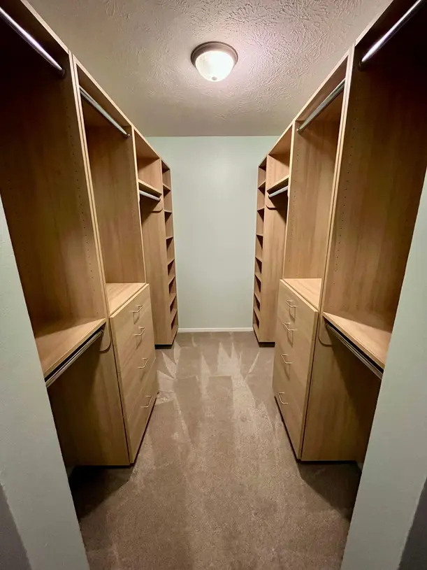 Custom walk-in closet with ample storage
