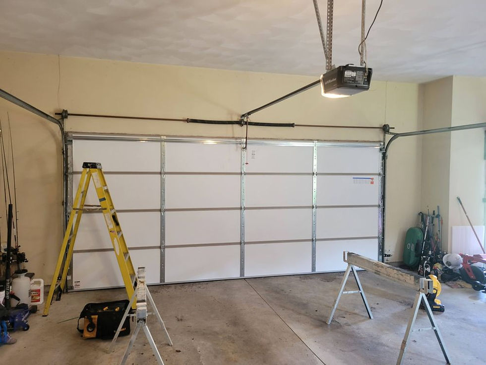 inside of a garage door being worked on