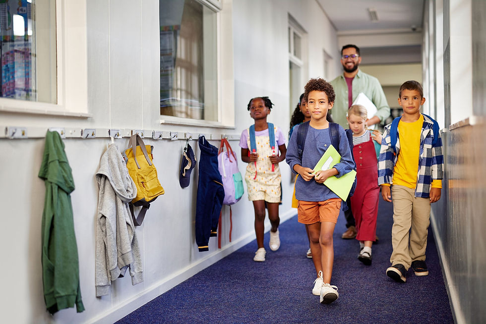 school-kids-walking-in-hallway-with-teacher
