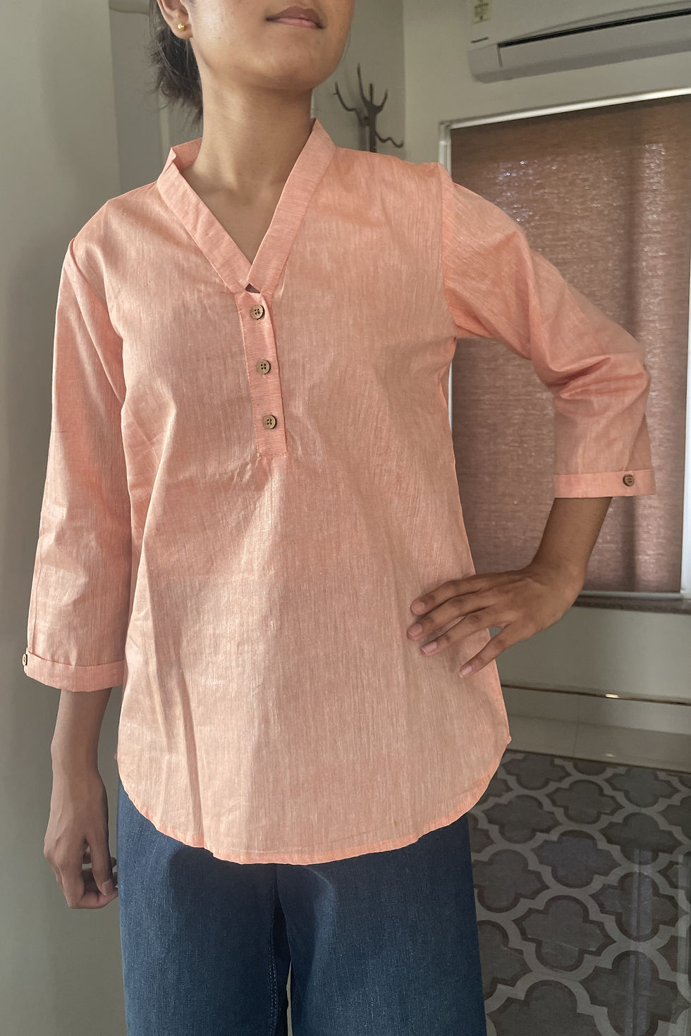 Thumbnail: Pastel Peach Handloom Short Kurta front closeup