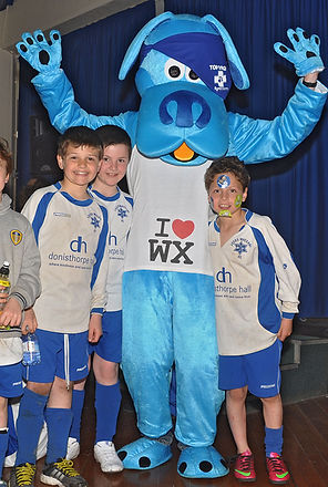 Justin dressed as Bertie the mascot to promote vet practice