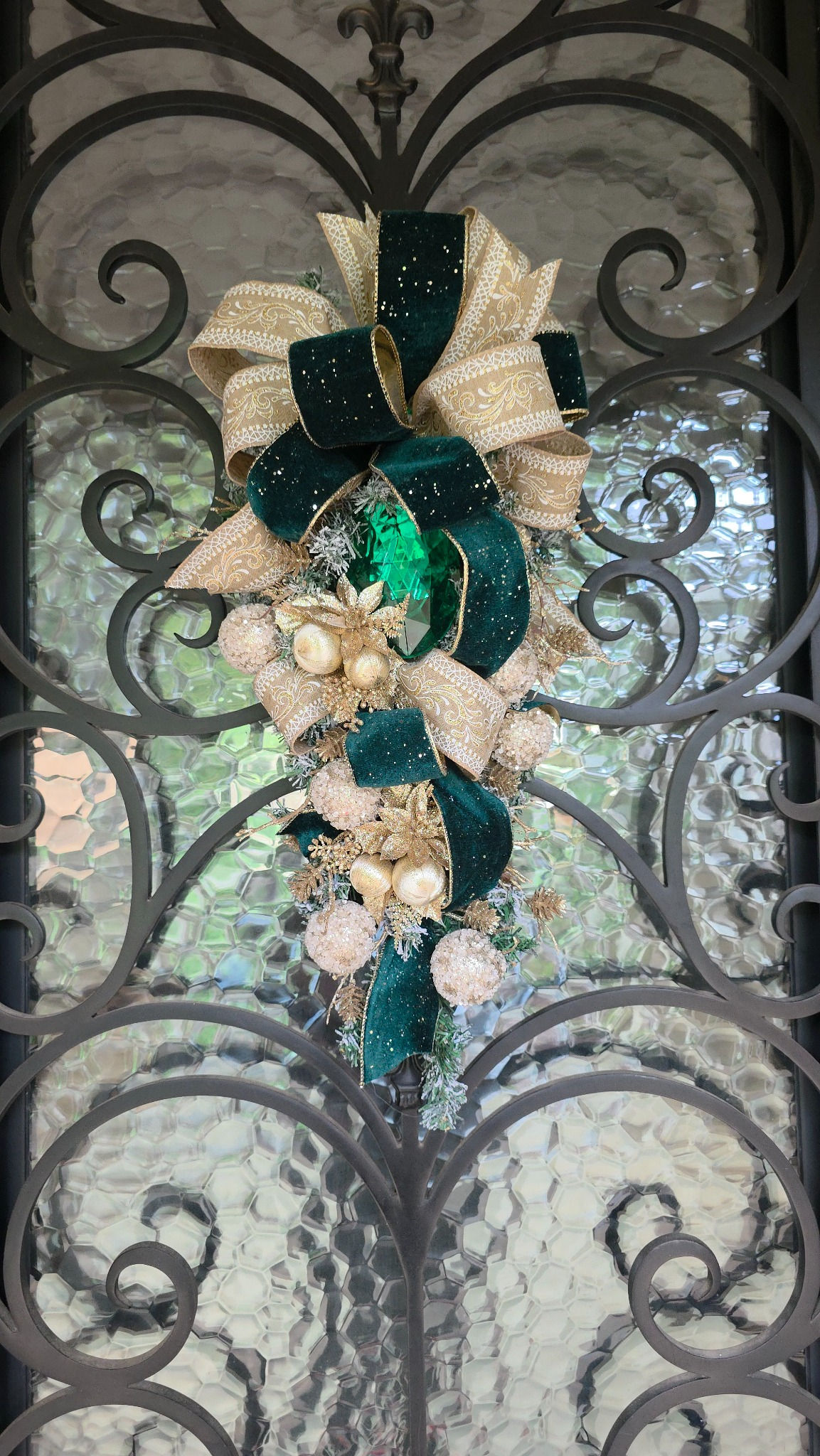 Emerald Gold Jeweled Christmas Swag with velvet ribbon bow and sparkling holiday accents