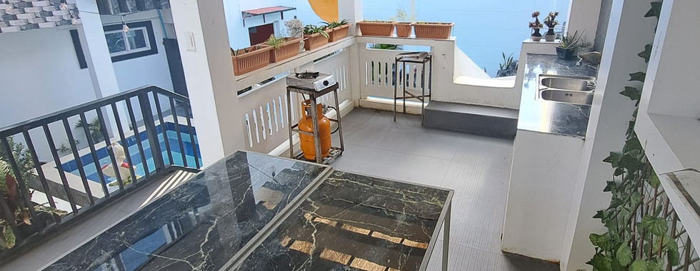 Cottage with cooking area and table