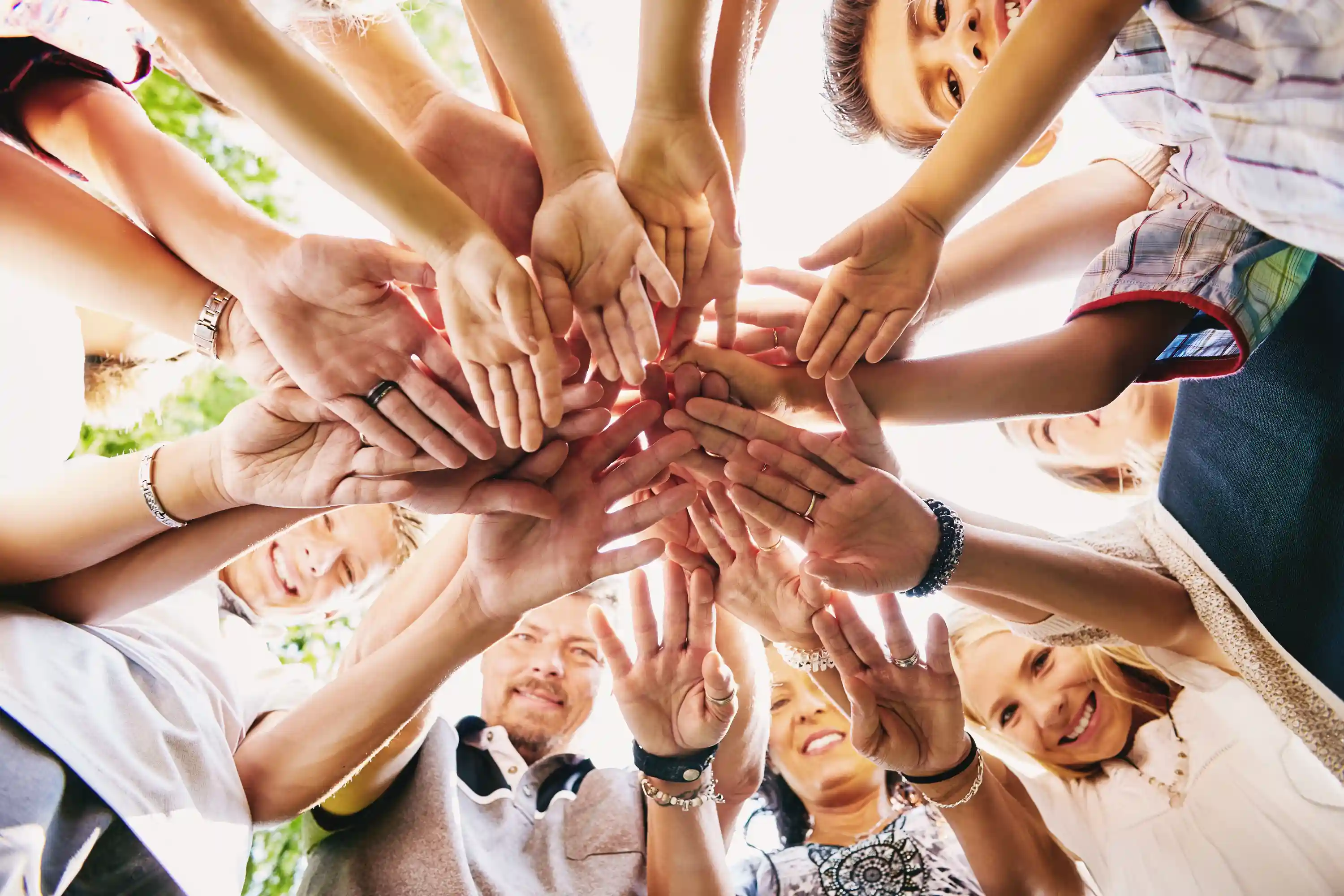 PEOPLE JOINING HANDS