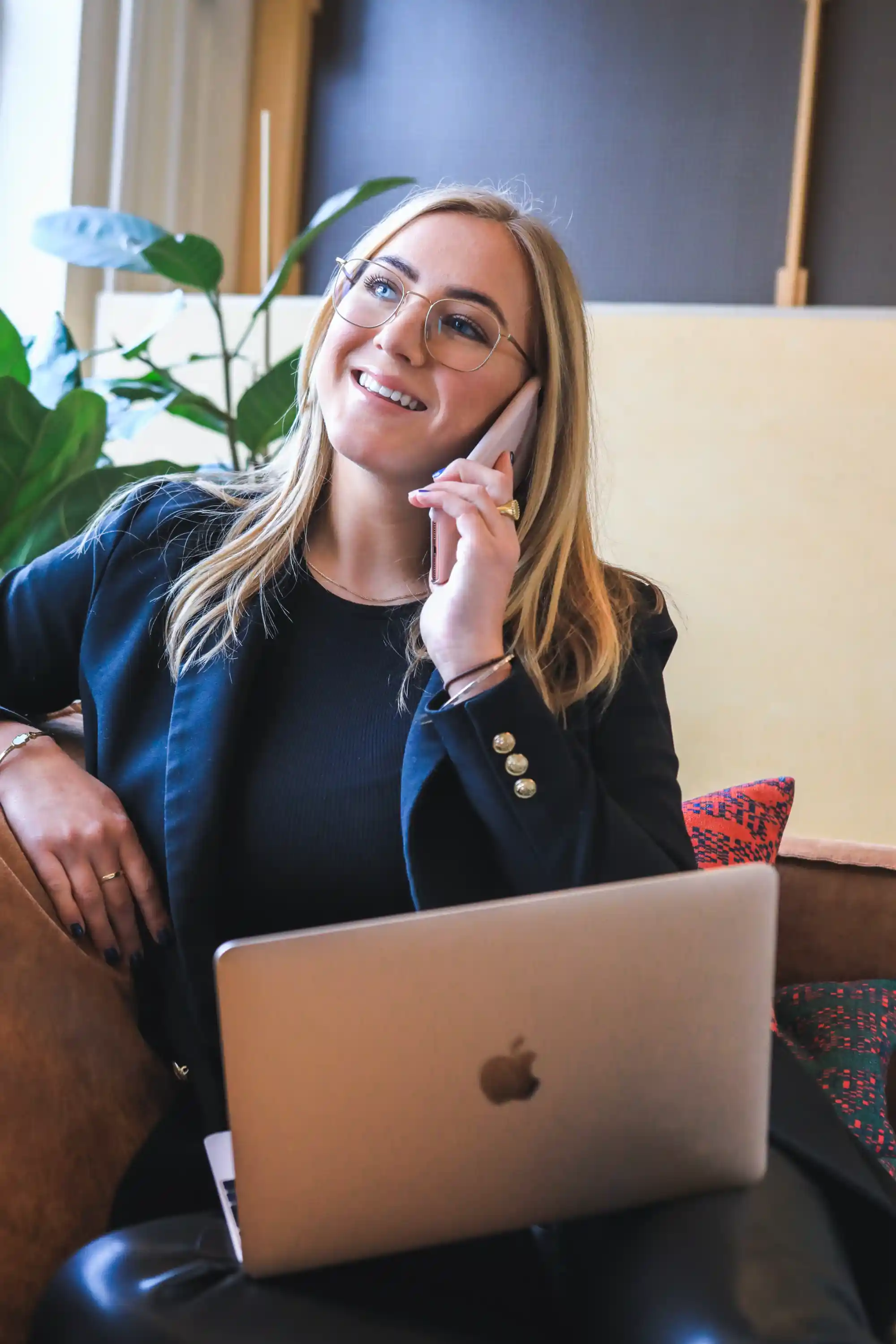 a woman entrepreneur talking to someone on her mobile phone