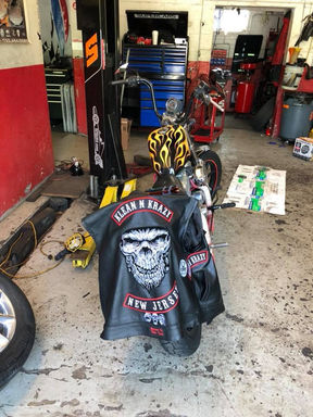 Klean N Krazy MC Cut Hanging on Bike in Garage