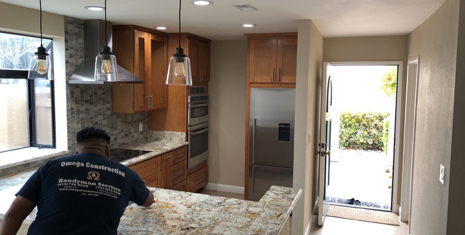 Contemporary Kitchen Remodel by Omega Construction & Handyman Services project photo 2