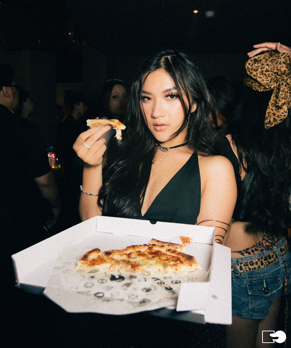Woman in fashion-forward outfit posing at nightclub in Ho Chi Minh City – Vietnam nightlife culture
