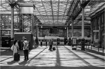 Class 801 electric multiple unit No. 801225 waits to leave Edinburgh Waverley station with 1E14, the 12:00 service to London Kings Cross on Thursday 25th September 2025.