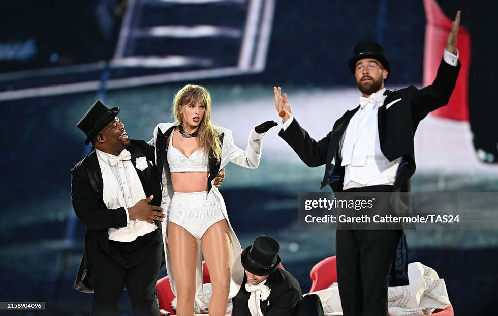Taylor Swift and Travis Kelce on stage