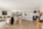 Timber flooring in bright open-plan kitchen and dining space