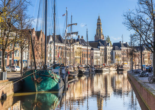 Panorama of historic ships and warehouses in the center of Groningen, Netherlands.jpg