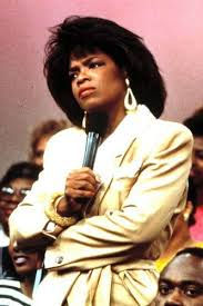 Oprah looking perplexed in the audience on the Oprah Winfrey Show