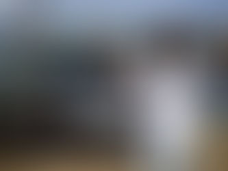 man rapping in front of a Mercedes-benz bayside