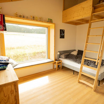 Kinderzimmer in einem Holzhaus