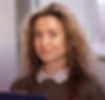 Smiling woman holding a clipboard