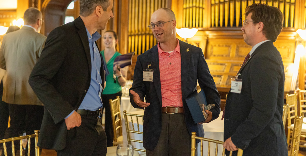 Dr. Jason Marion mingling with peers