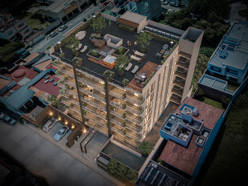 Vista aérea del desarrollo Torre Nubes que muestra su rooftop con amenidades, jacuzzi, asadores, gym equipado y terraza bar.