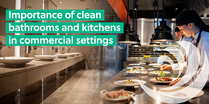 Chef plating food in a commercial kitchen beside clean bathroom sinks, highlighting hygiene standards in hospitality environments.