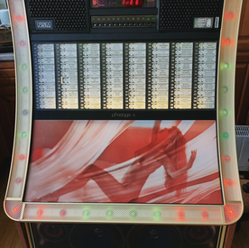 NSM Prestige II jukebox for sale with a lady front panel