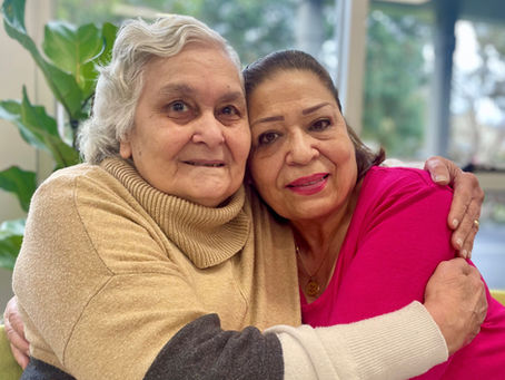 Two women embracing