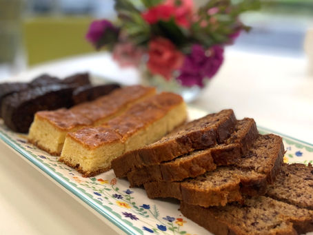 three types of cakes on a decorative platter.