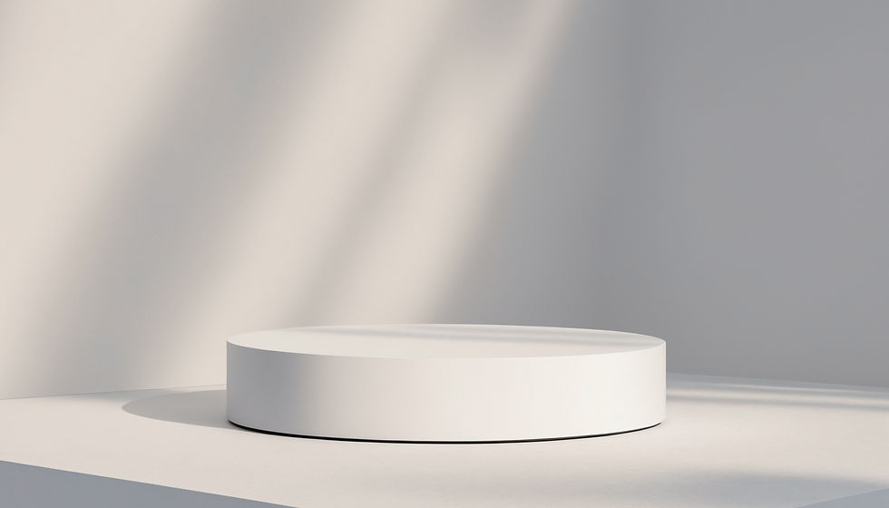 Solitary white cylinder platform sits on a white surface, bathed in soft light, creating a