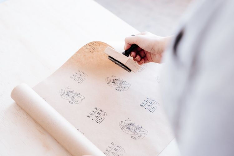 Hand printed paper with wooden stamp