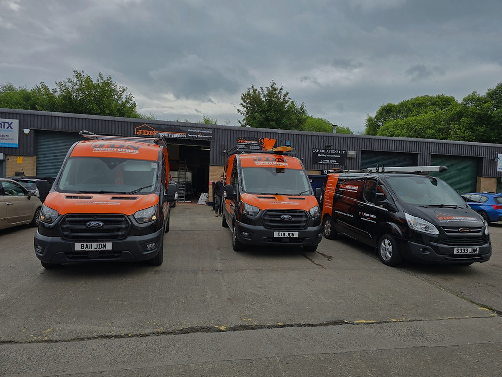 Company vans outside of warehouse