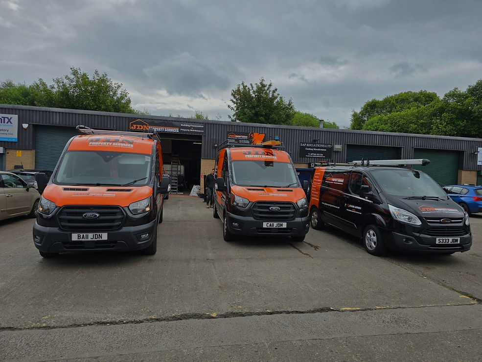 Company vans outside of warehouse