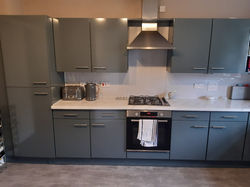 Kitchen wrapping for Garry & Vicki Mullen in Edinburgh - after cupboard have been wrapped in grey