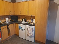 Kitchen Wrapped for Mr & Mrs Lessells in Dunfermline, Fife - before image of wood effect kitchen