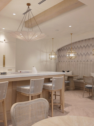 Hospitality area and High Point Market Furniture Showroom with neutral colors and large pendant lights