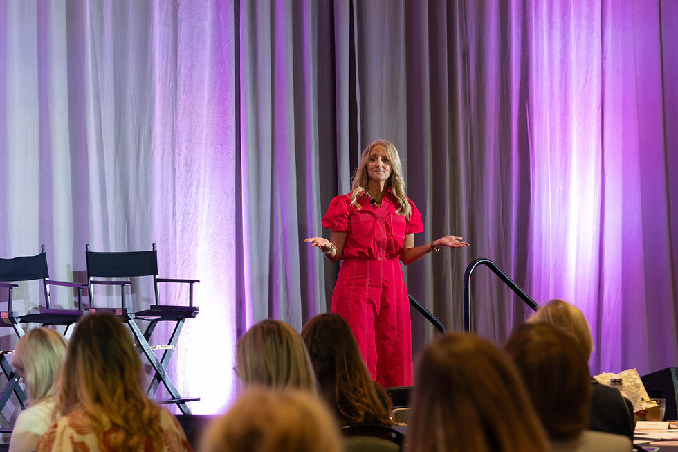 Christi Barbour, Founder of Barbour Spangle Design, speaking to an audience at NKBA's Women To Women Conference.