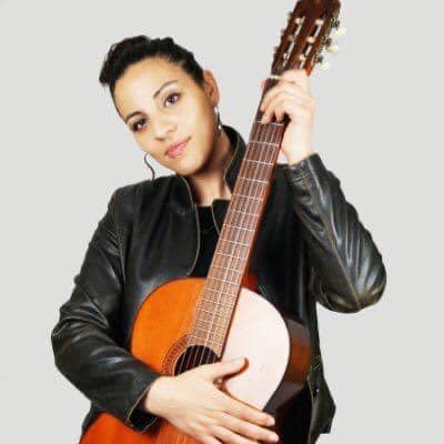 Image of Christella Latras with guitar