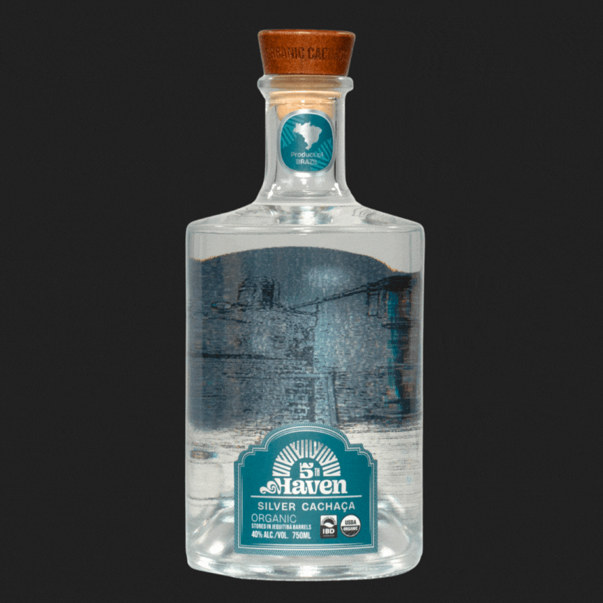 Animated GIF of 5th Haven Organic Cachaça bottle, a premium small-batch Brazilian cachaça from the Atlantic Forest.