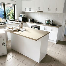 Repaint of laminated cupboard doors, Installation of new counter tops.